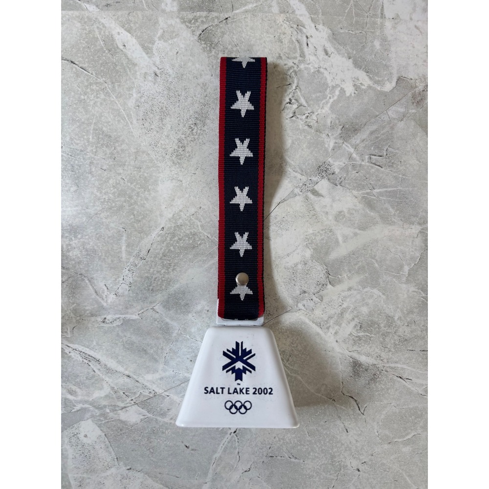 Salt Lake 2002 Winter Olympics Souvenir Cowbell White Metal Star Strap Logo
